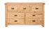 Melbourne Natural Oak 7-drawer wide chest on a white background. Available from A Quirky Corner Banbury.