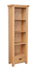 Slim bookshelf with a drawer on a white background. Available from A Quirky Corner Banbury