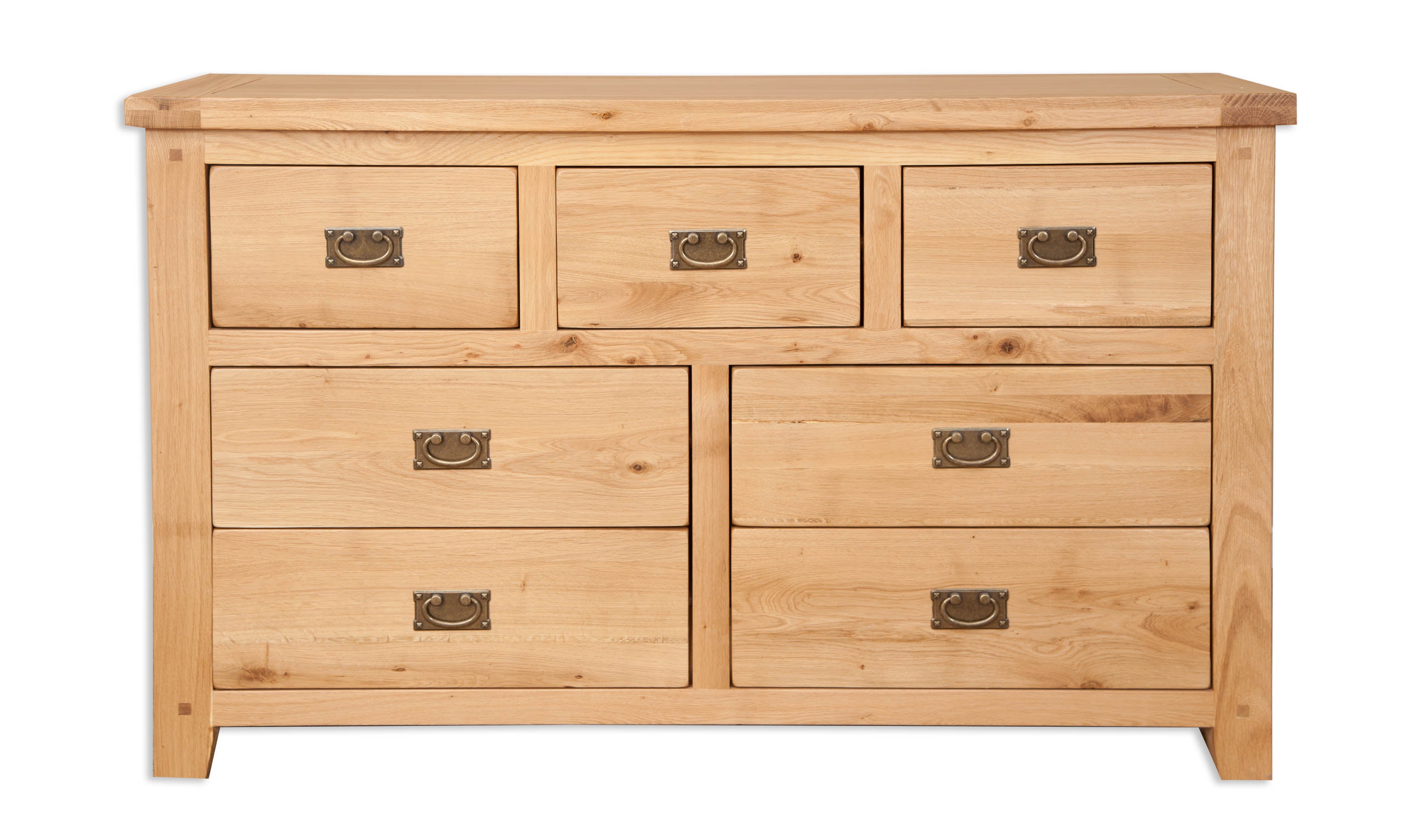 Melbourne Natural Oak 7-drawer wide chest on a white background. Available from A Quirky Corner Banbury.